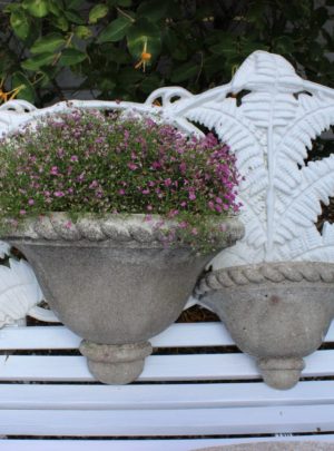 Pair of beautiful old wall jars with patina.